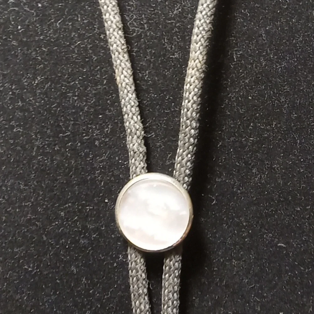 Kids mother of pearl Tie. About 16 inches.